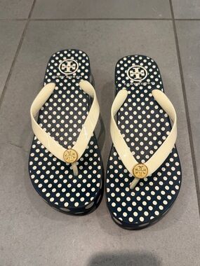 Tory Burch Navy Polka Dot Platform Flip Flops with Cream Straps and Gold Logo